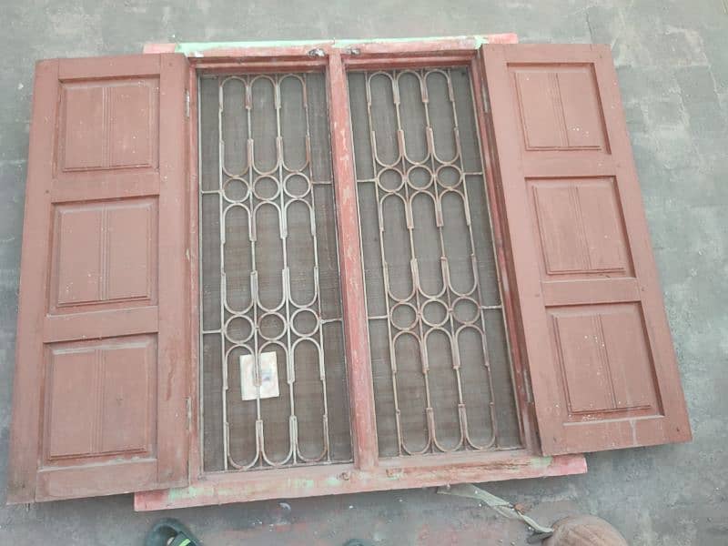 Wood Window with Iron Grill 3 x 4 ft 0