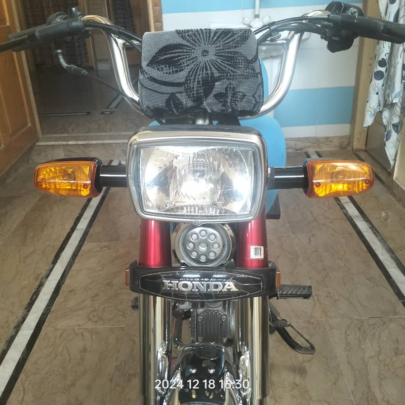 Honda CD 70 2024 4