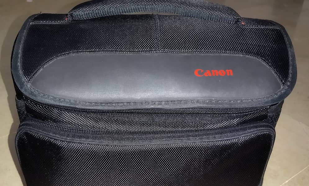 Canon 90D with 18-135mm Lens, Flash Light, SD Card, Bag &Extra Battery 1