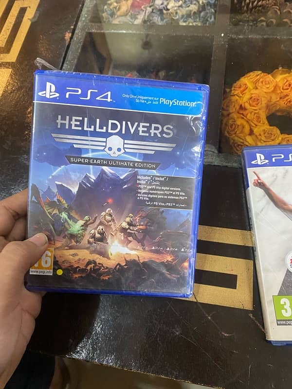 PS4 game Fifa 23+Helldivers 1