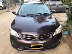 Toyota Corolla XLI 2013 Red Wine coour