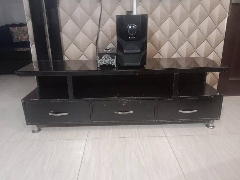 TV Console Table with Glass on it. 0