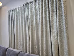 Silk curtains , grey in colour