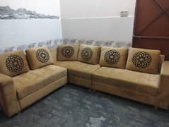 6 month slightly used L shaped costom made high quality sofa for sale