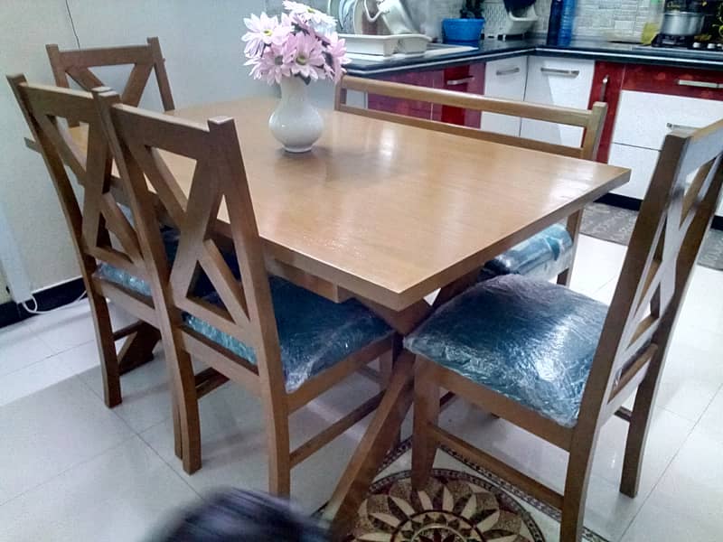 Brand new Modern wood dining table with 4 chairs and seater 0