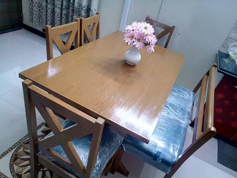 Brand new Modern wood dining table with 4 chairs and seater 1