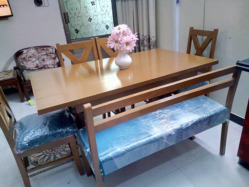 Brand new Modern wood dining table with 4 chairs and seater 2