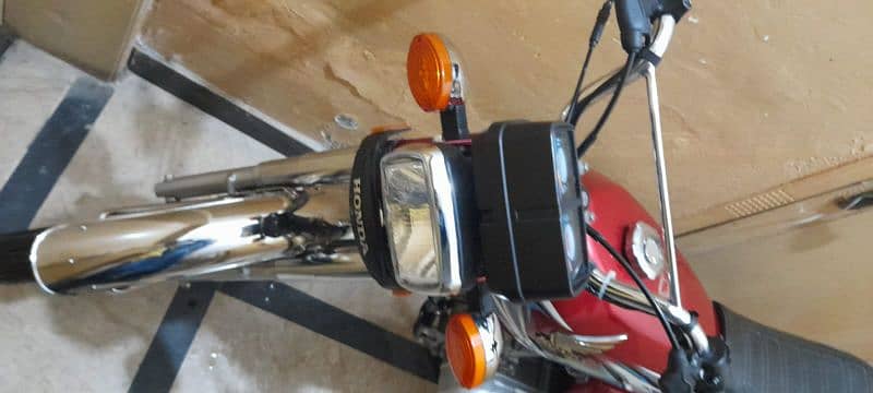 Honda 125 model 2022 7700  km Driven   Islamabad register 8