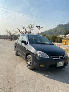 Suzuki Liana 2007 lahore number contact  /03165994109