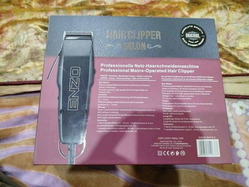 Enzo professional hair trimmer with clips. 1