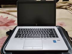 perfect condition hp folio 9480p. slim book , silver color