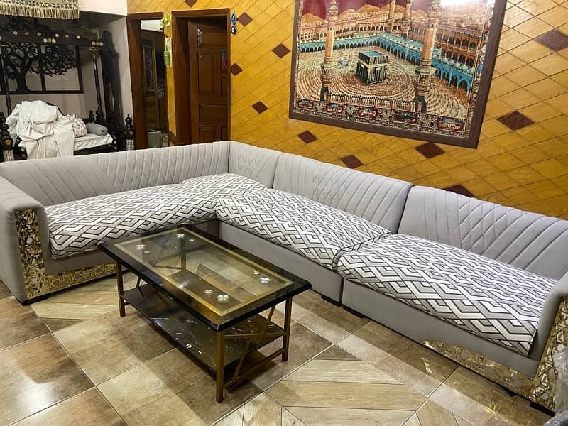 L shaped 8 seater sofa with center table 0