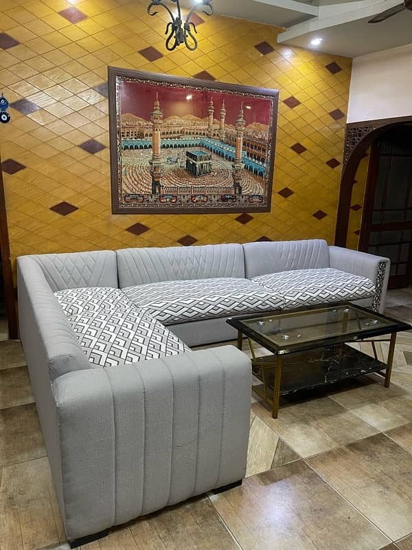 L shaped 8 seater sofa with center table 3