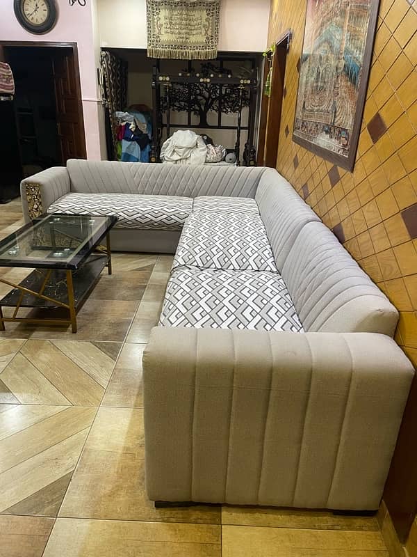 L shaped 8 seater sofa with center table 5