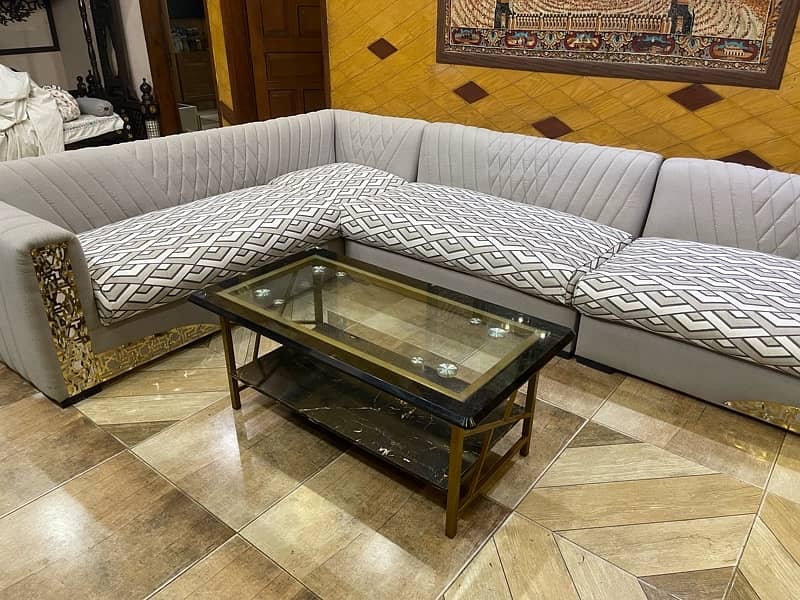 L shaped 8 seater sofa with center table 8