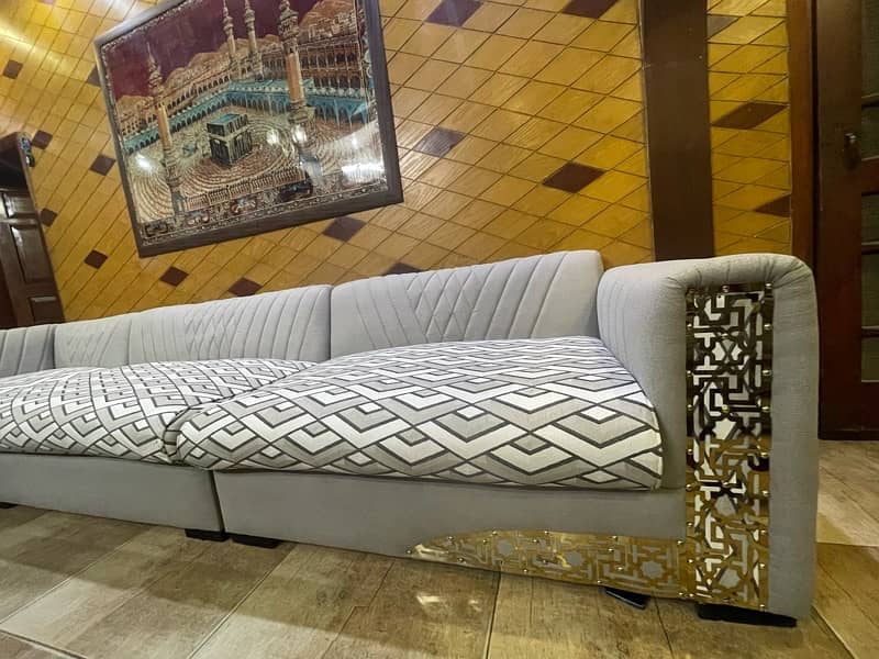 L shaped 8 seater sofa with center table 10