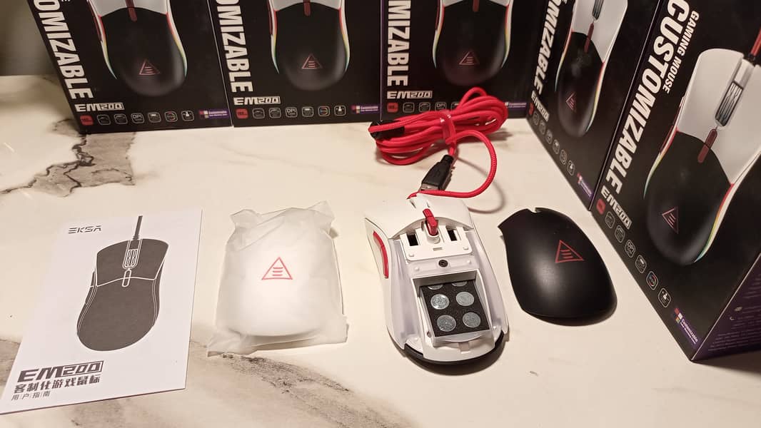 Eksa em200 customizable mouse with tunable weight system. 1