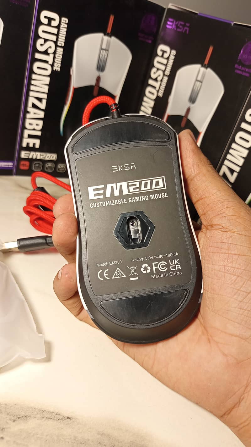 Eksa em200 customizable mouse with tunable weight system. 6