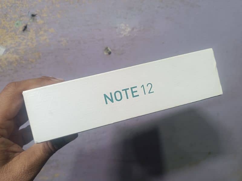 infinix Note 12 128gb8gb with box and adabtor fingerprint off ha 1