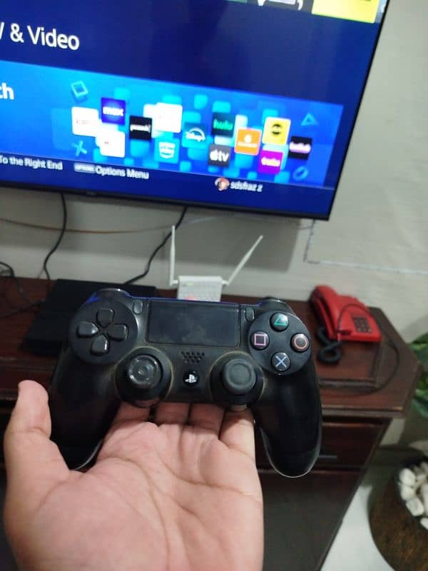 PS4 fat with two controllers 5