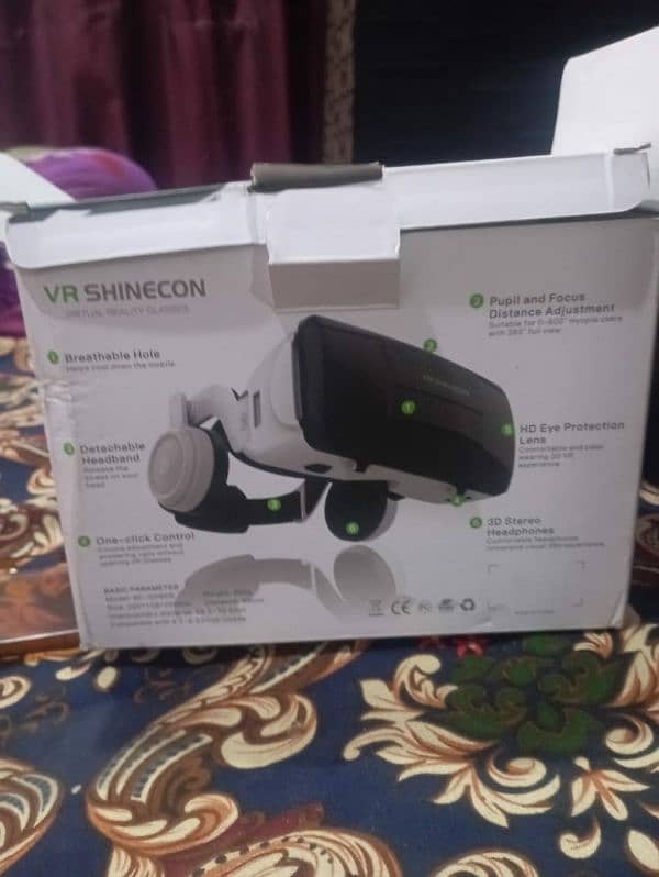 vr box with headphone and remote 0