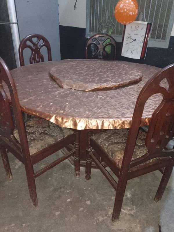 round and rotate dining table with 5 chairs 1