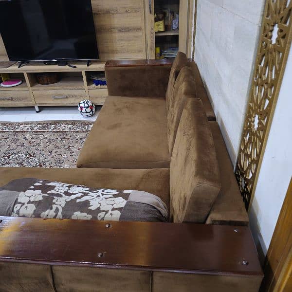 Slightly Used L Shaped Sofa with wooden arm rests 6