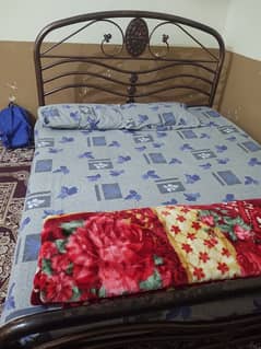 Iron bed Queen size, and 2 mattress foam good condition