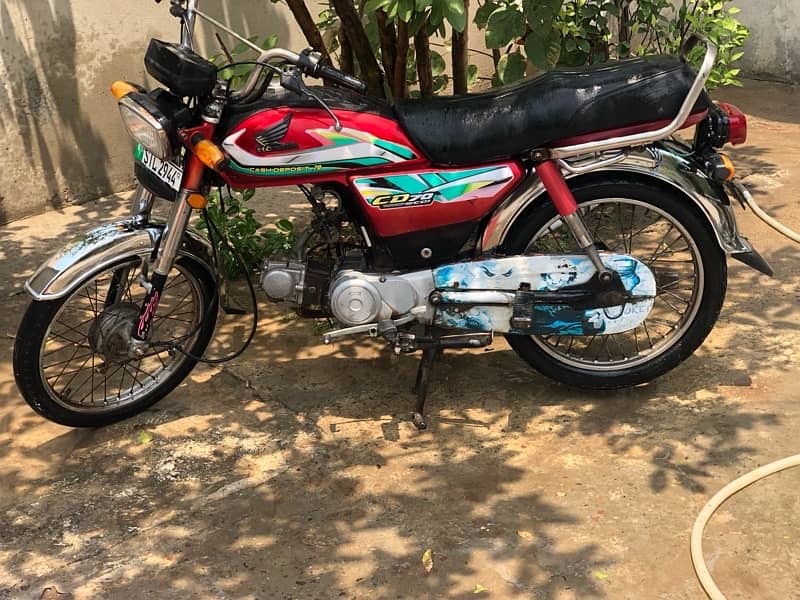 Honda CD70 12 model 55km fuel average 1