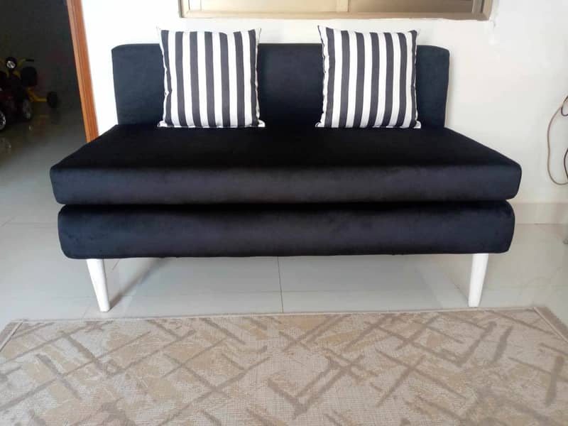 2 seater  black   velvet sofa . 2