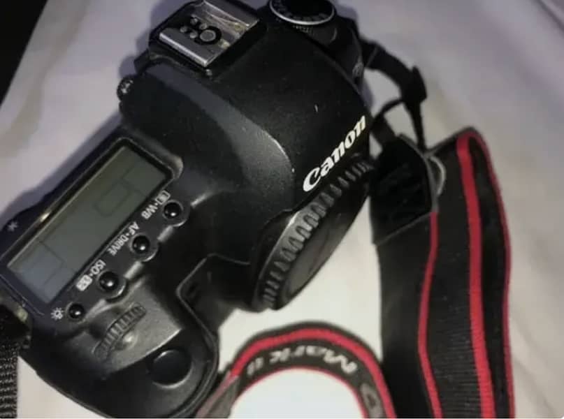 canon 5d mark 2 ii + 50mm lens+ battery charger 1