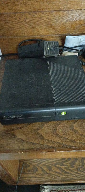 xbox 360 slim with 2 wireless controllers 8 to 10 games installed 0