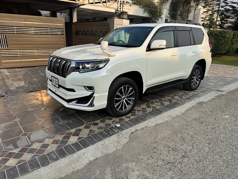 TOYOTA PRADO TXL 2019 7 SEATER PEARL WHITE BIEGE ROOM DEC 2024 IMPORT 1