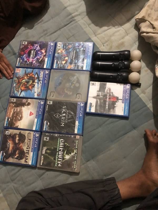 ps move controllers and cds for sale 0