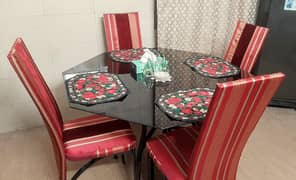 Stylish Dinning set with Hexagonal glass .