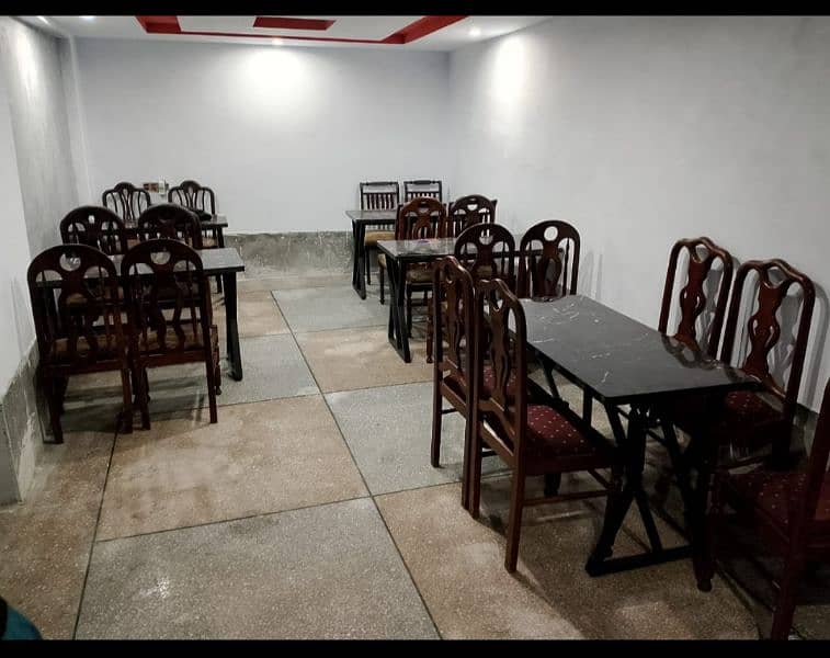 table with chairs for restaurant setup 0