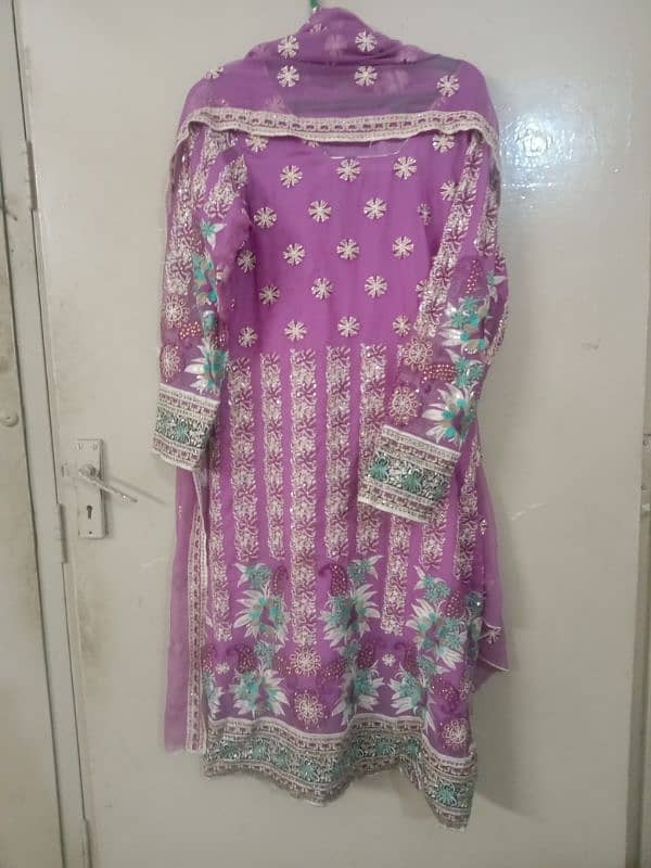 Elegant and gently used purple dress 0