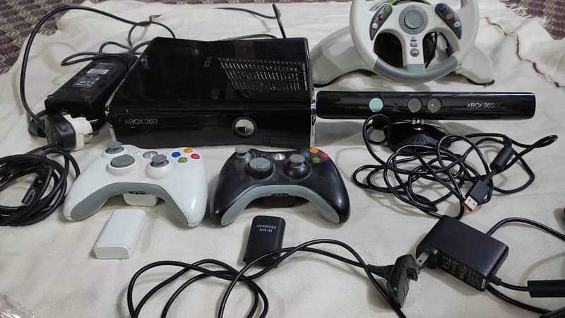 Xbox 360 slim jtag with two controllers and other accessories 0