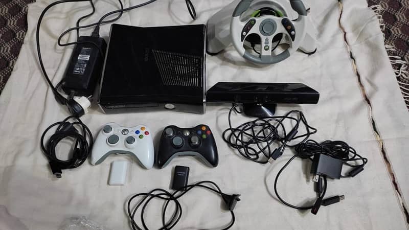 Xbox 360 slim jtag with two controllers and other accessories 1