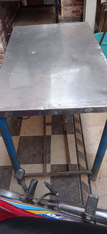 4 steel table and 1 steel counter 4