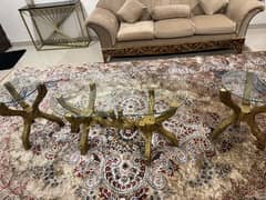 3 piece Center wooden table with antique designs nd class on da top