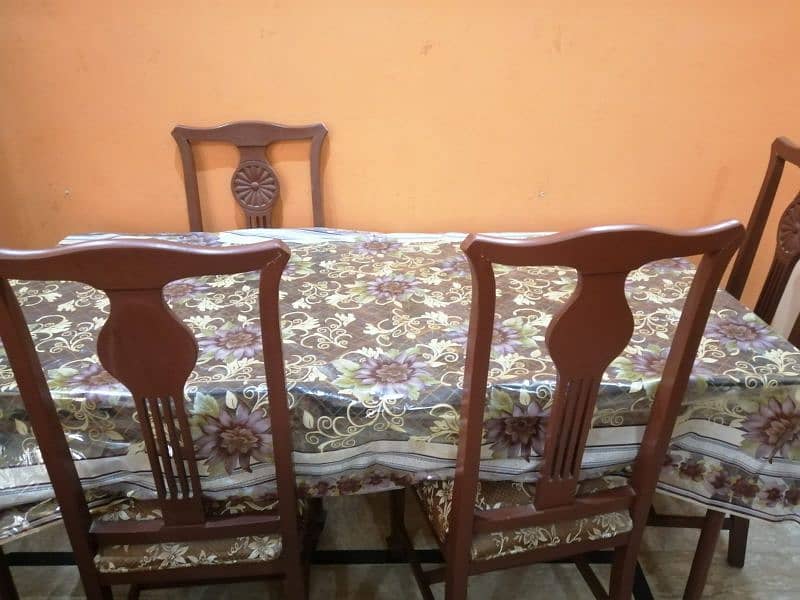 Dinning Table + 6 chairs in good condition 0