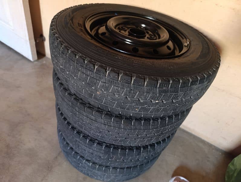 145/80R12 tubeless tyre set with original japan rim in good condition 1