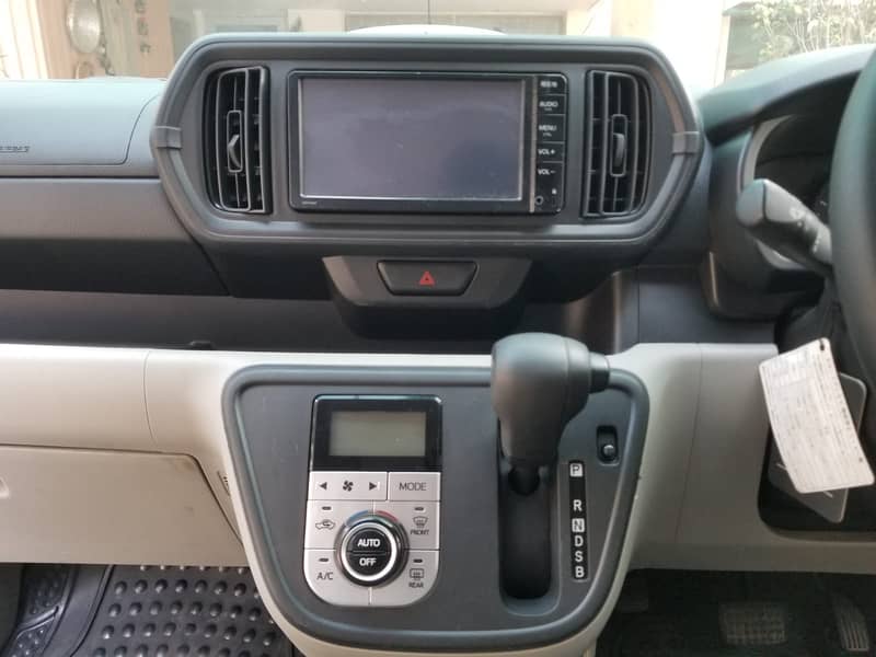 Toyota Passo 2019 in pearl white colour. 11