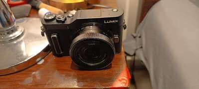 Panasonic Lumix GF10 mirrorless M4/3 camera with 12-32mm lens. 4k.