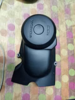 Honda 125 ka engine cover original ha upar mate black colour howa ha