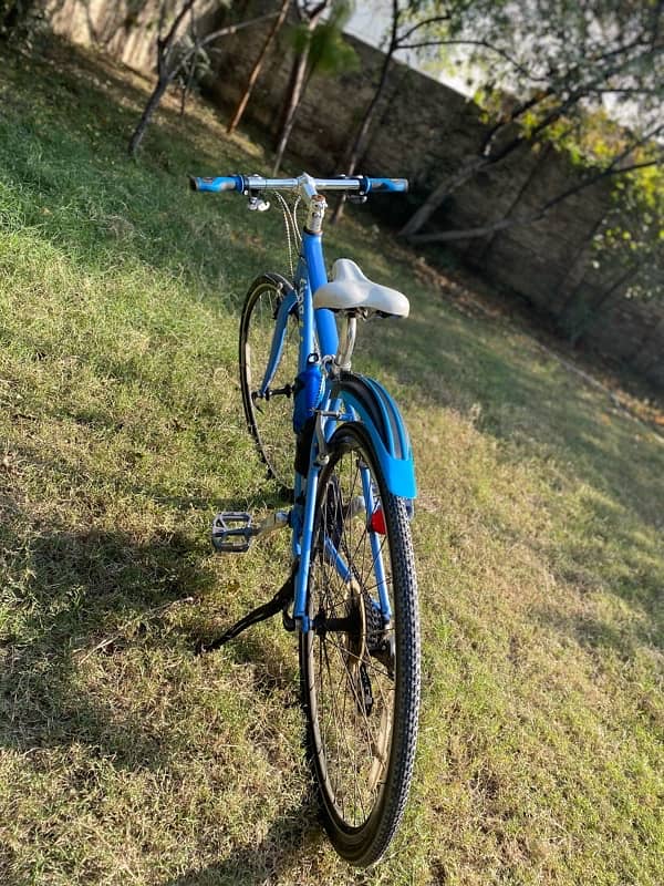 beautiful blue sports bicycle for sale 0