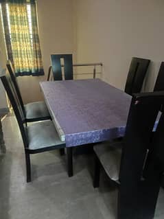 6 chairs dining table, two chairs can be added.