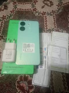 Infinix smart 7 4/64 with boxcharger