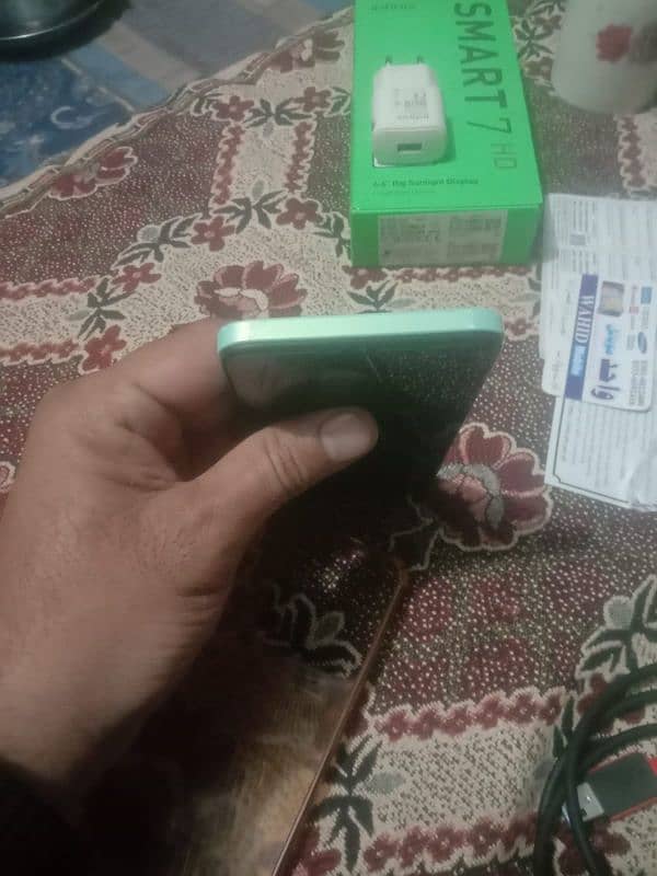 Infinix smart 7 4/64 with boxcharger 6